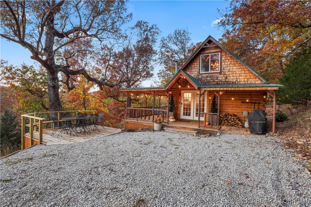 Picturesque cabin with lake view martini deck and