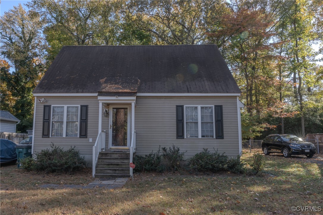 front view of a house with a yard