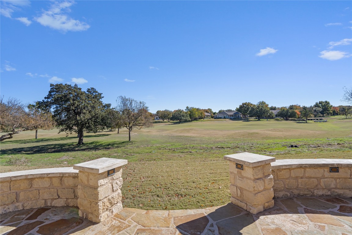 a view of a lake with a yard