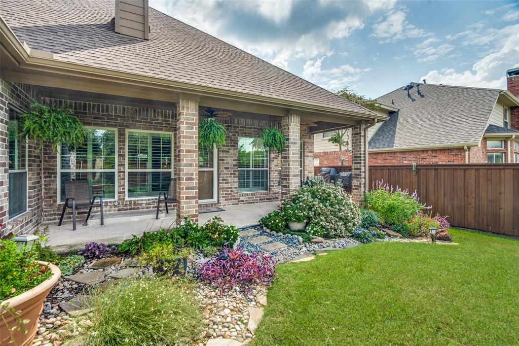 a garden view with a seating space