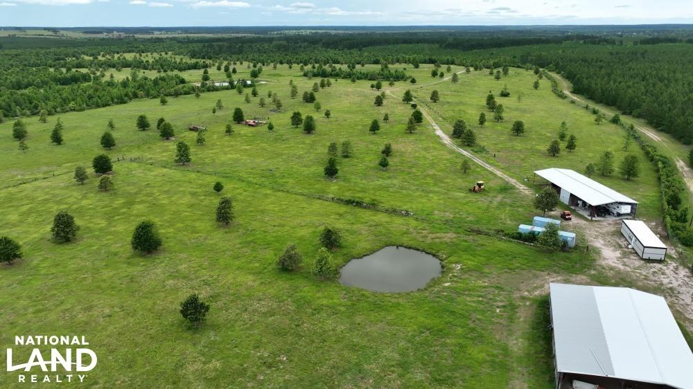 a view of a lake with a yard