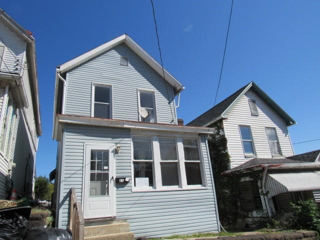 a front view of a house with balcony