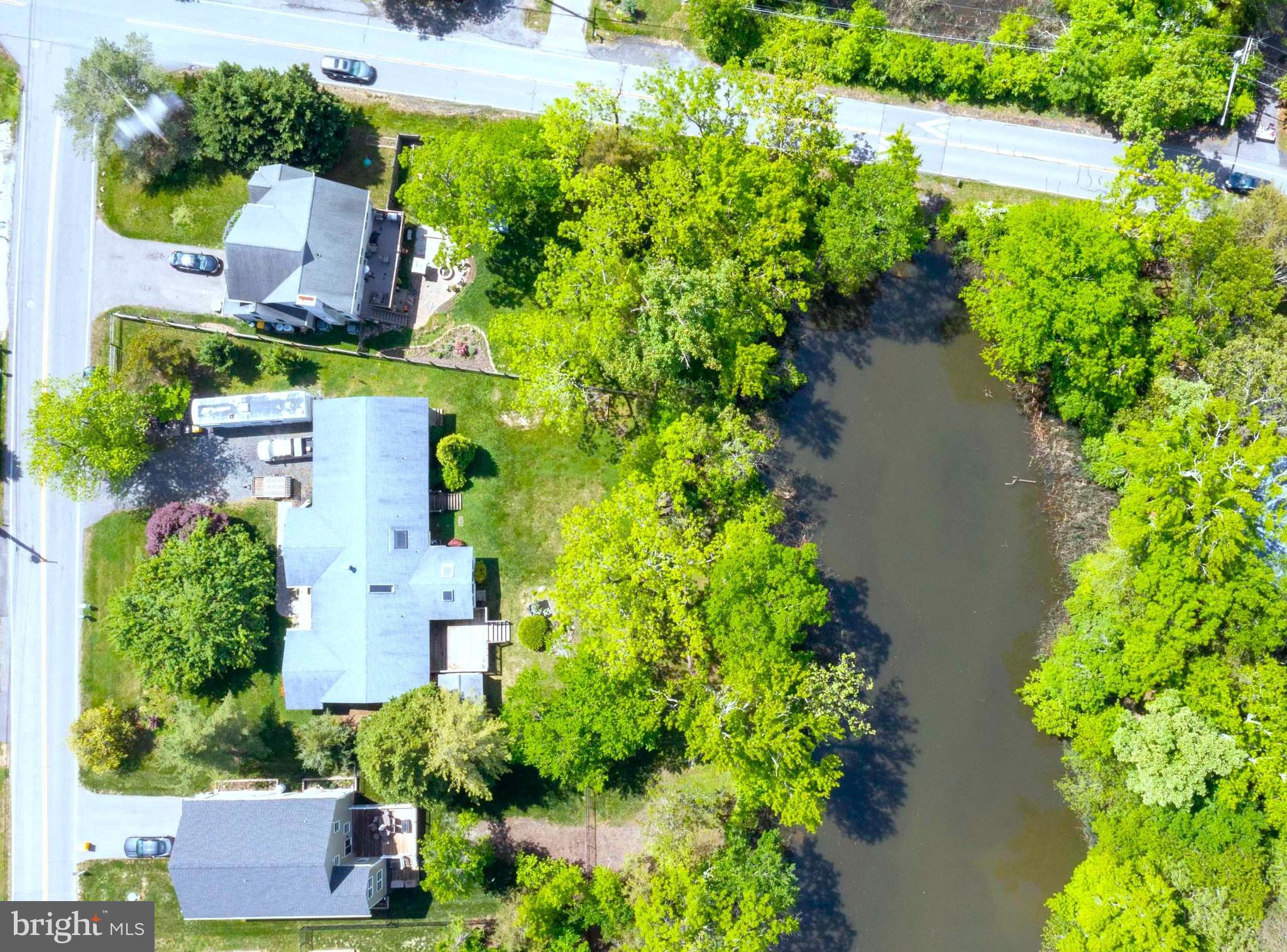 an aerial view of house with yard