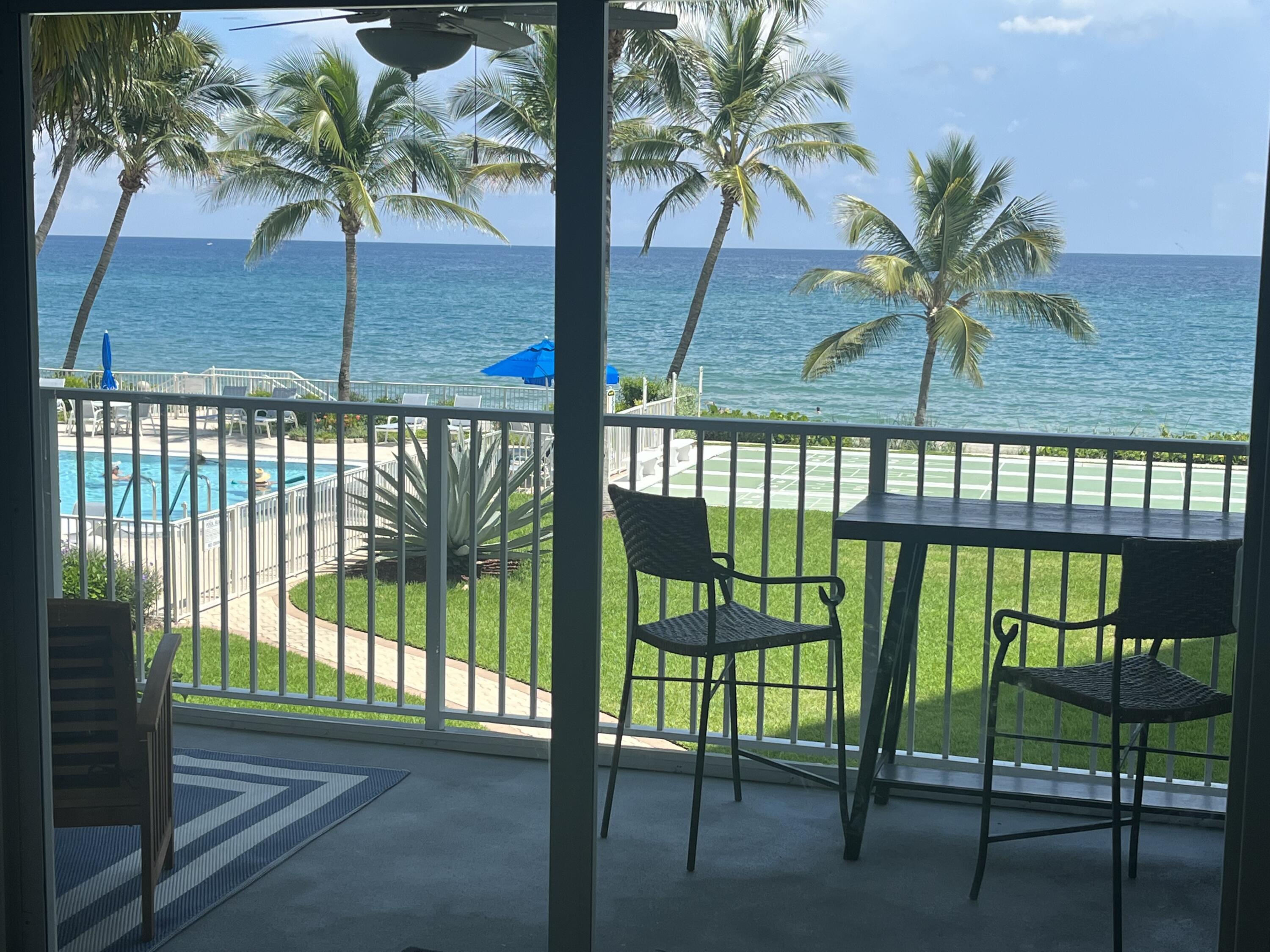 a view of balcony with a floor to ceiling window