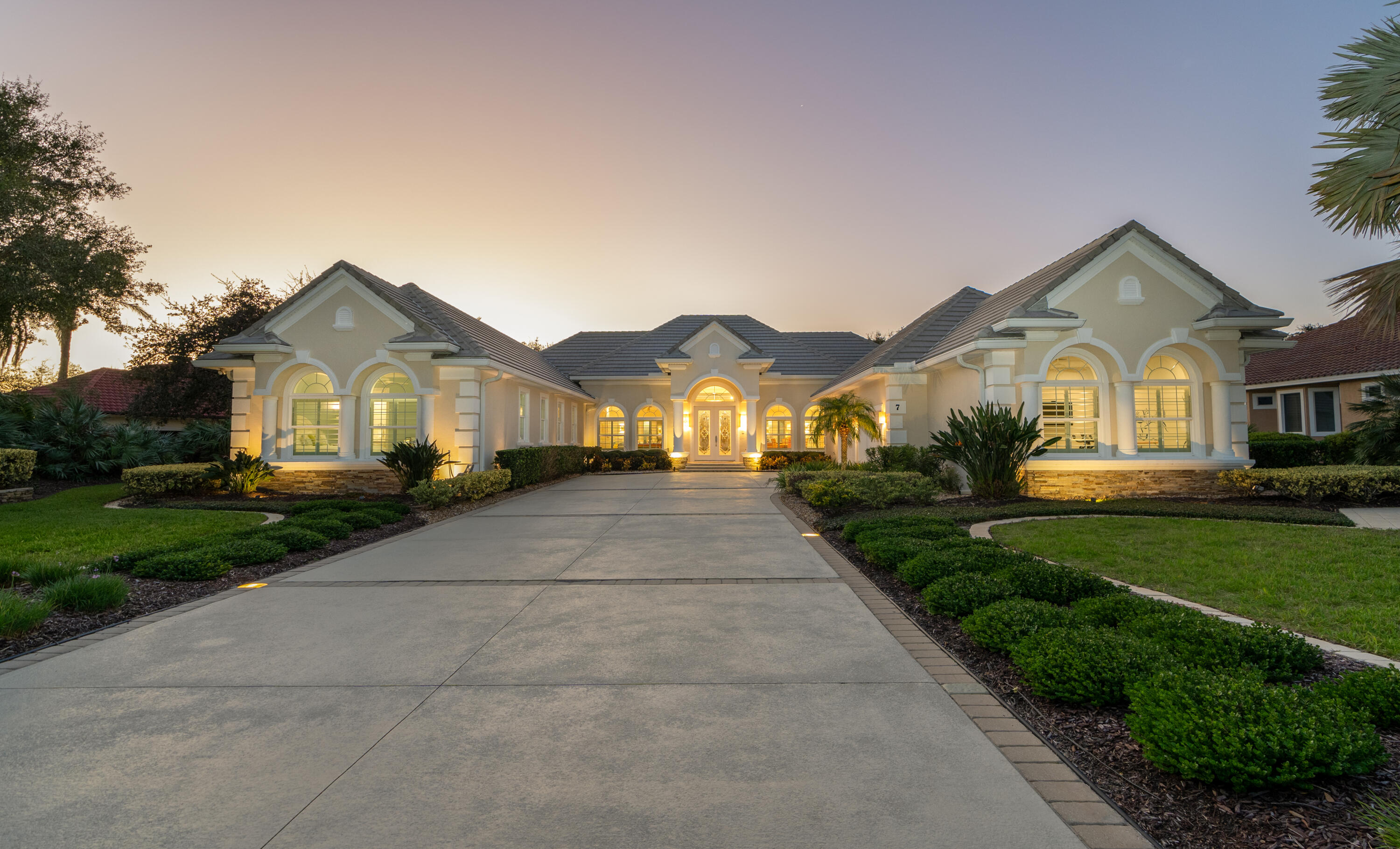 a front view of a house with yard