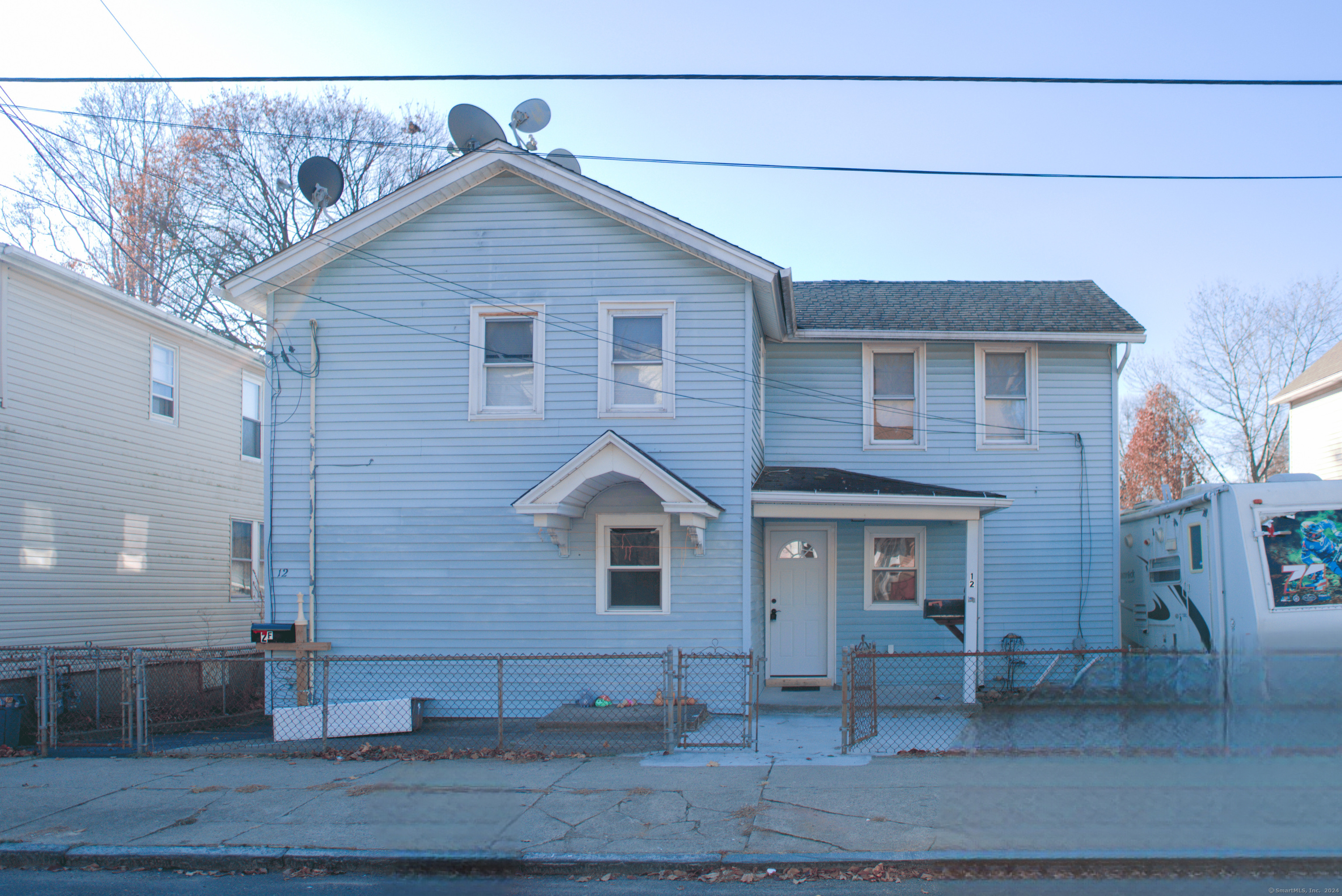 a front view of a house with garage