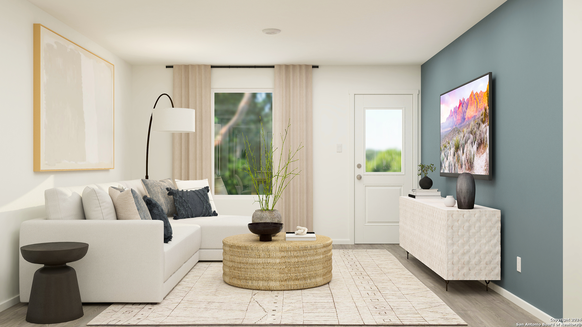 a living room with furniture and large window