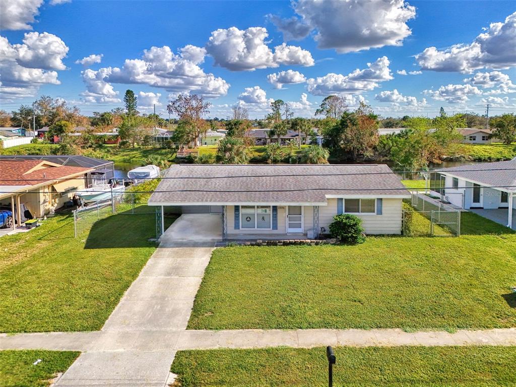 a view of a house with a big yard