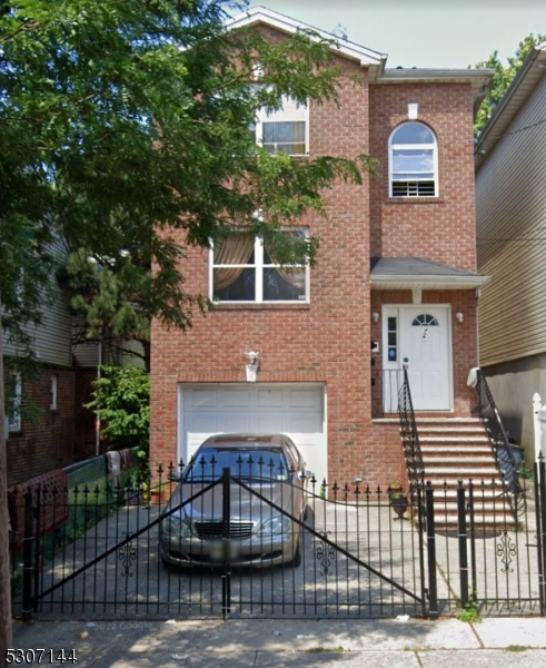 a front view of a house with a balcony