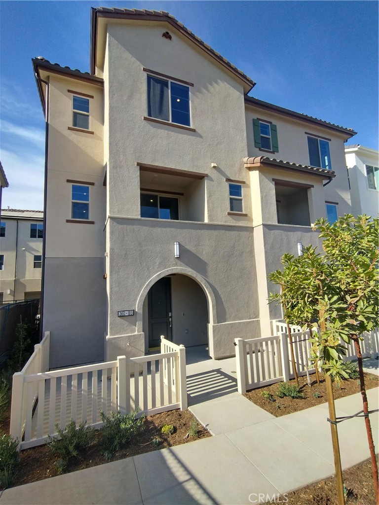 a front view of a house with balcony