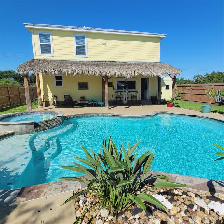 front view of a house with a big yard