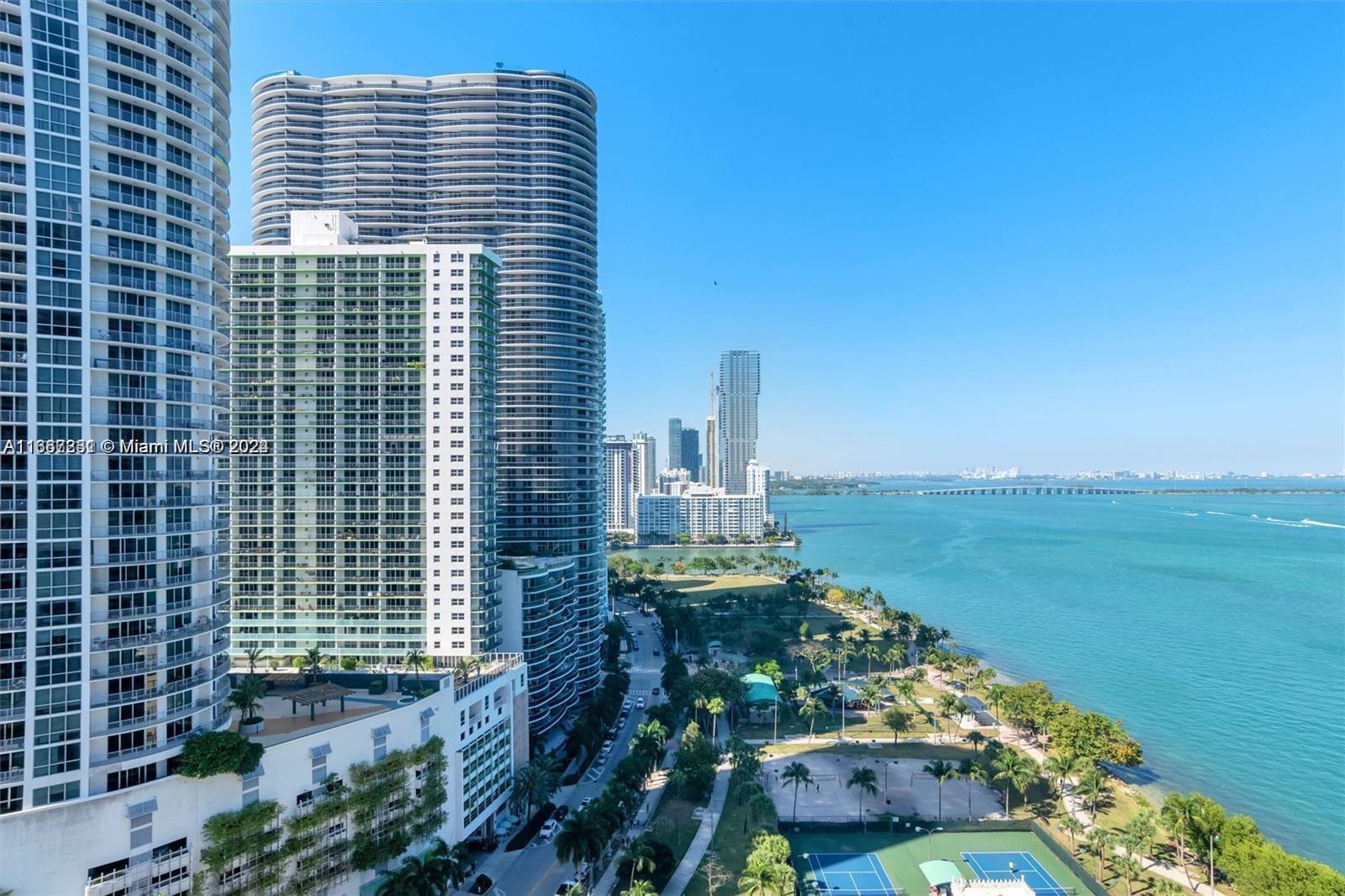 a view of a city with tall buildings