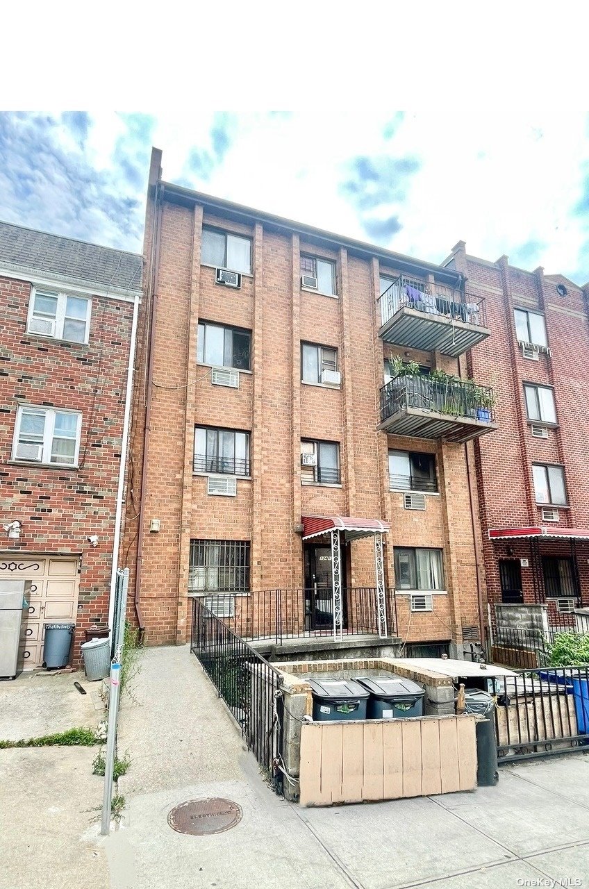 a front view of a multi story residential apartment building