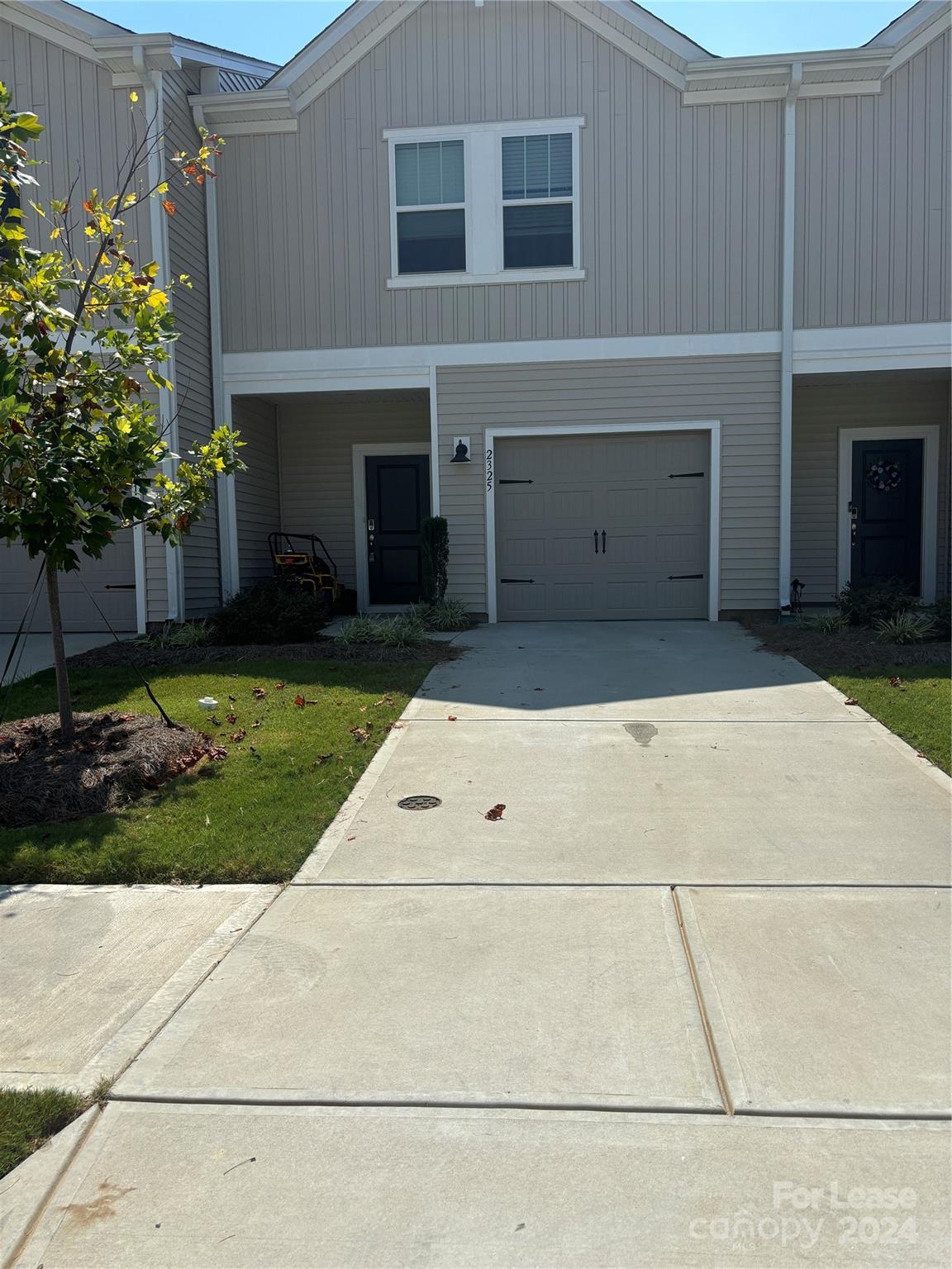 a view of house and yard