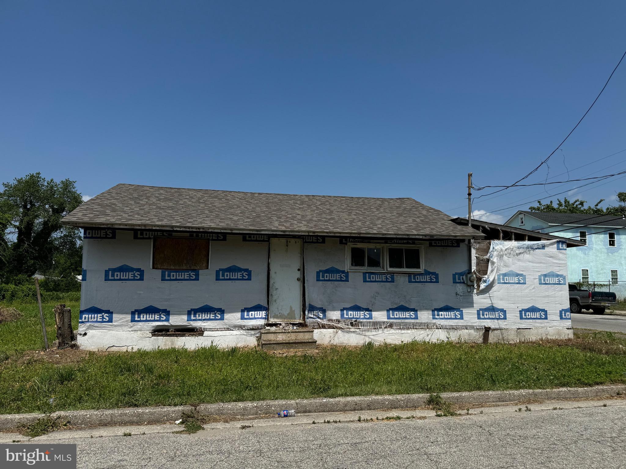 a front view of a building with garage