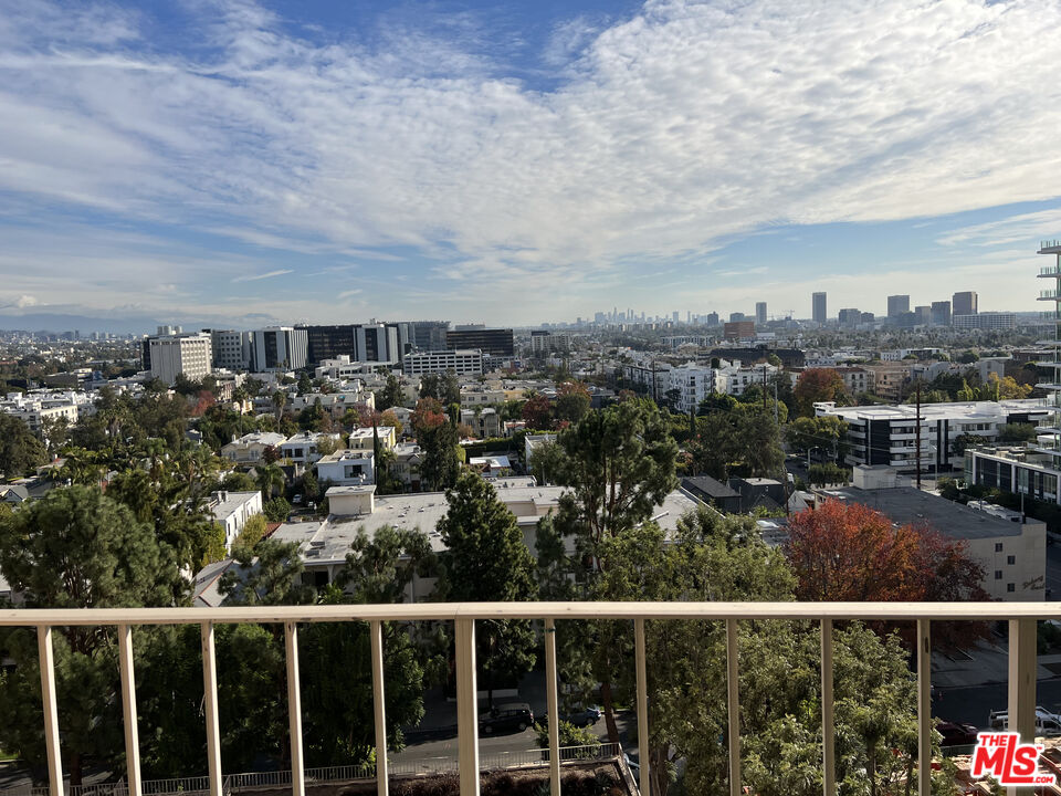 a view of a city from a balcony