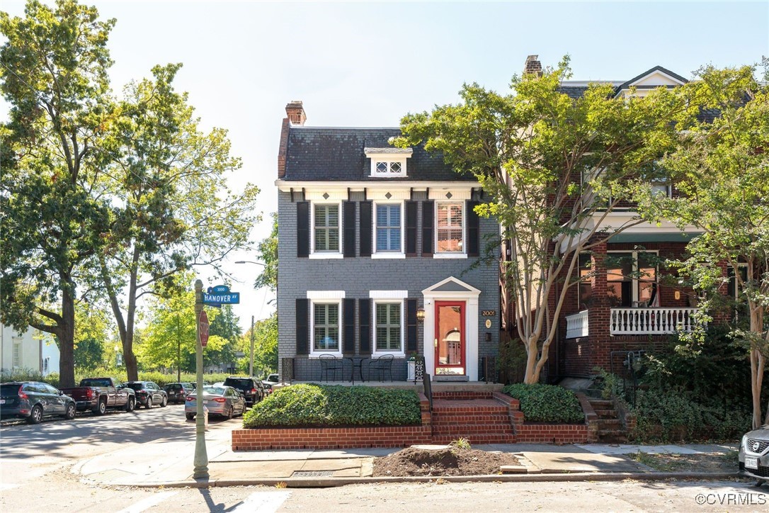 a front view of a building with street view