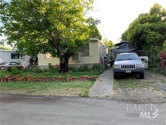 a car parked in front of a house