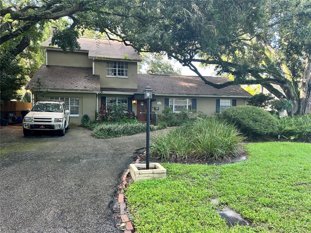 a car parked in front of a house