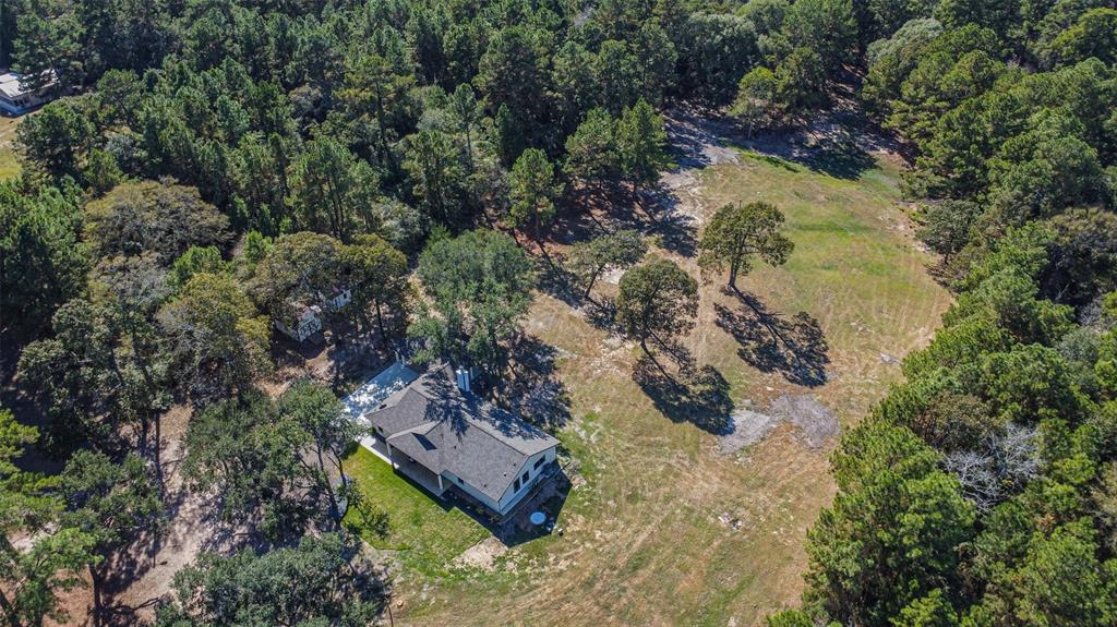 Incredible 6.5 acre unrestricted property with fully remodeled ranch style one story home is surrounded by trees that afford privacy and serenity.