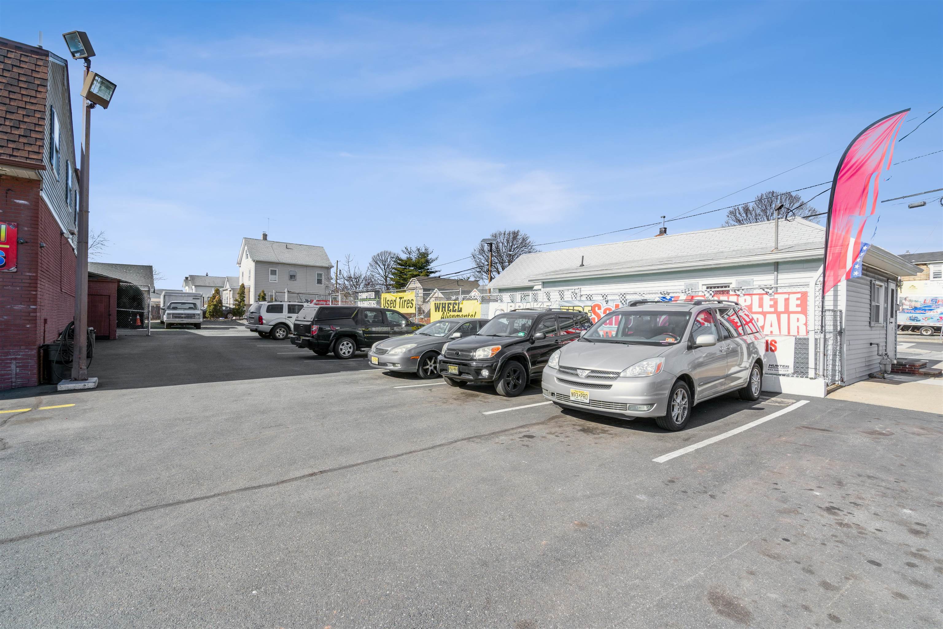 a view of parking with cars parked