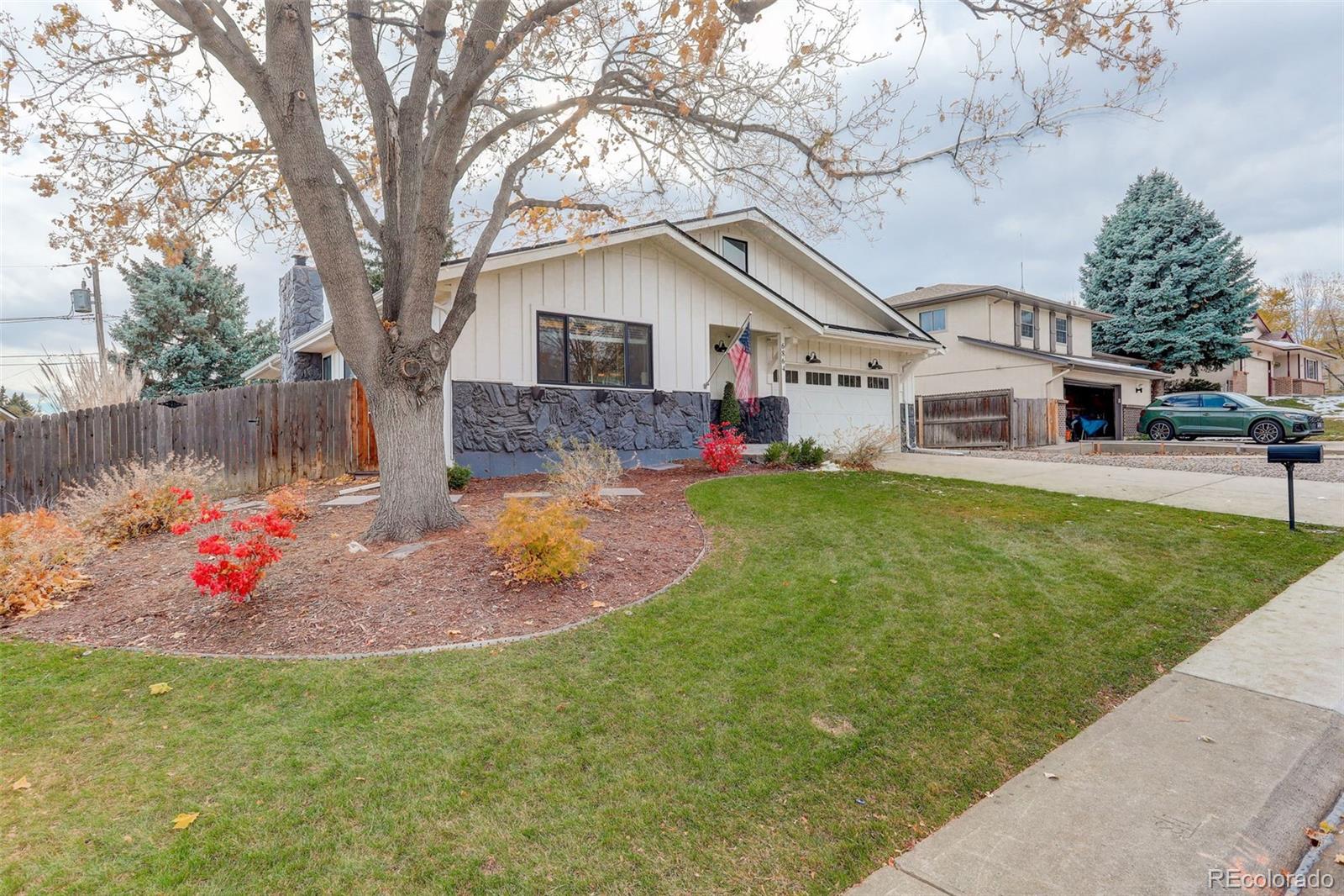 a front view of house with garden