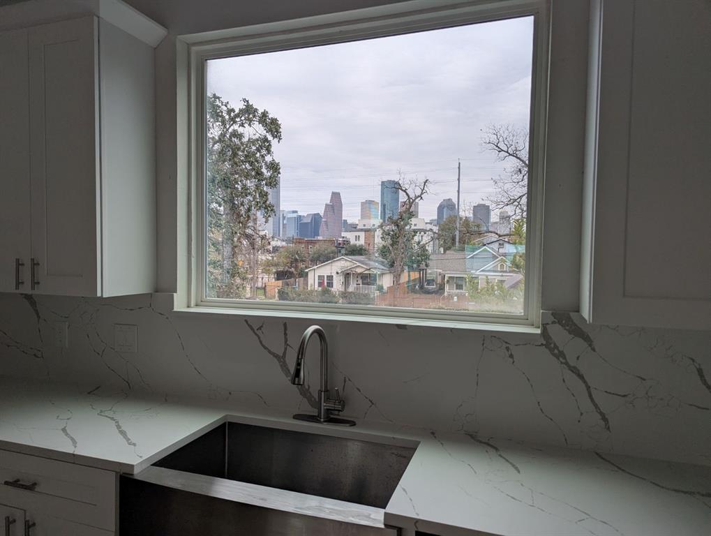 a view of a sink with a window