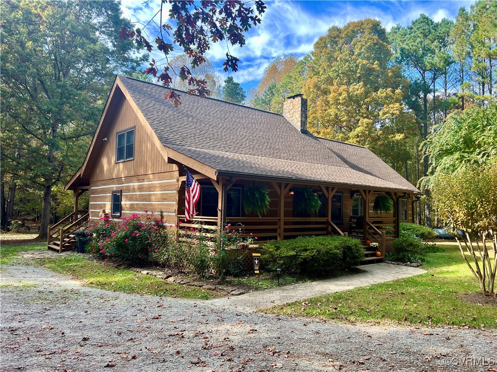 View of front of home featuring covered porch