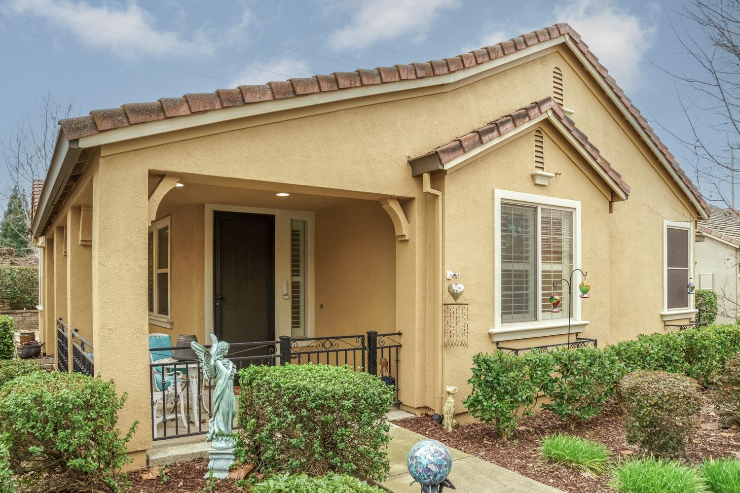 front view of a house with a small yard