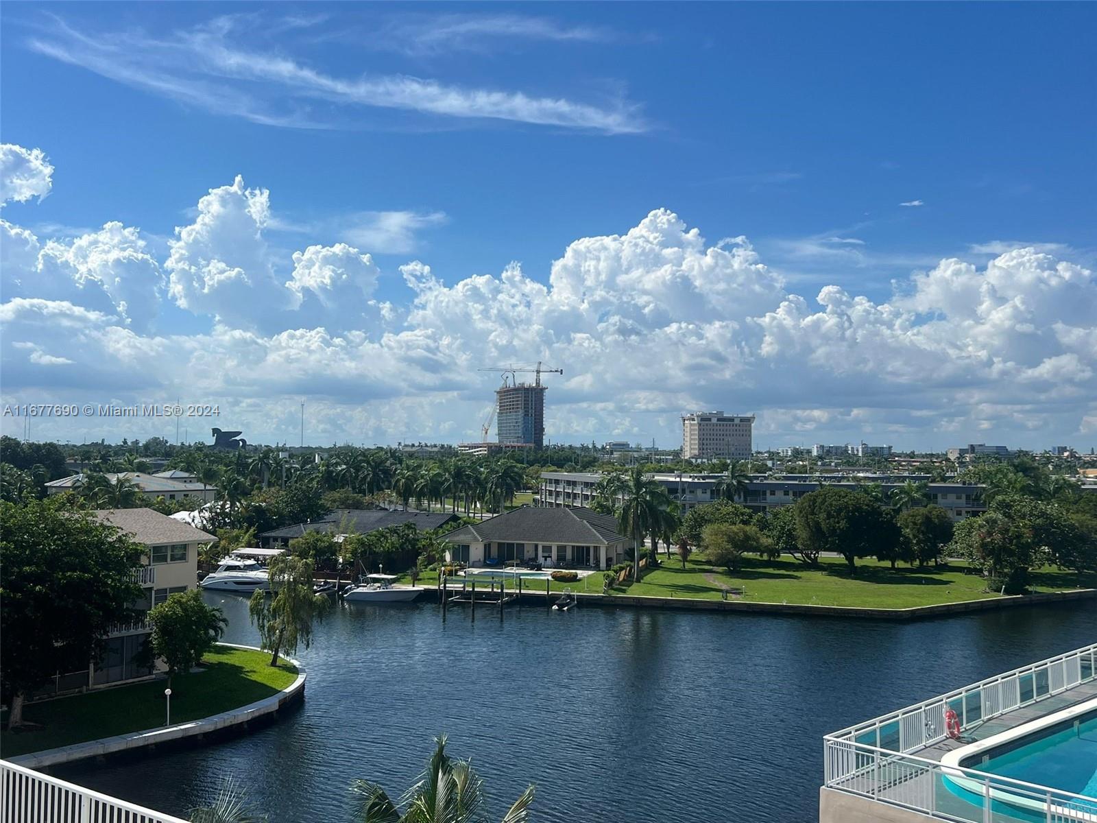 a view of a lake with a city