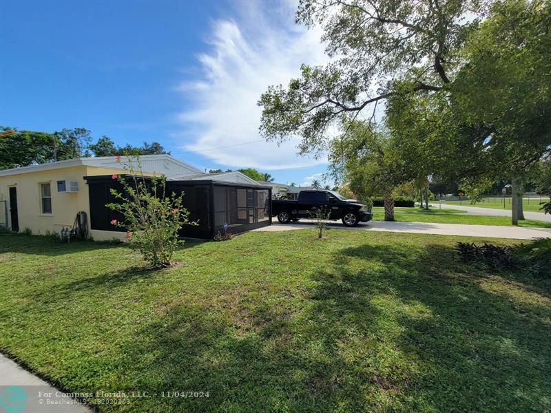 a view of a house with a big yard