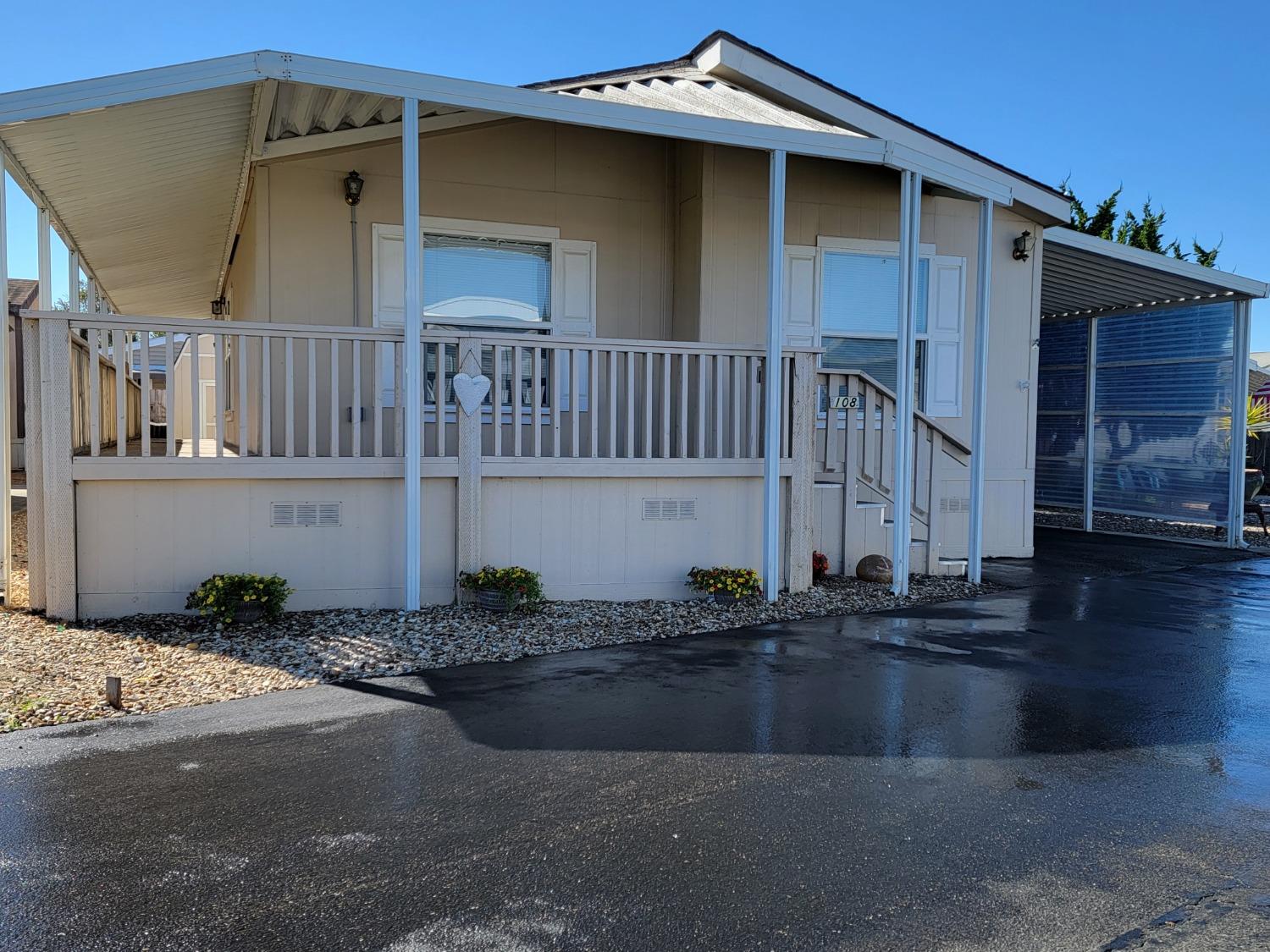 a front view of a house with garage