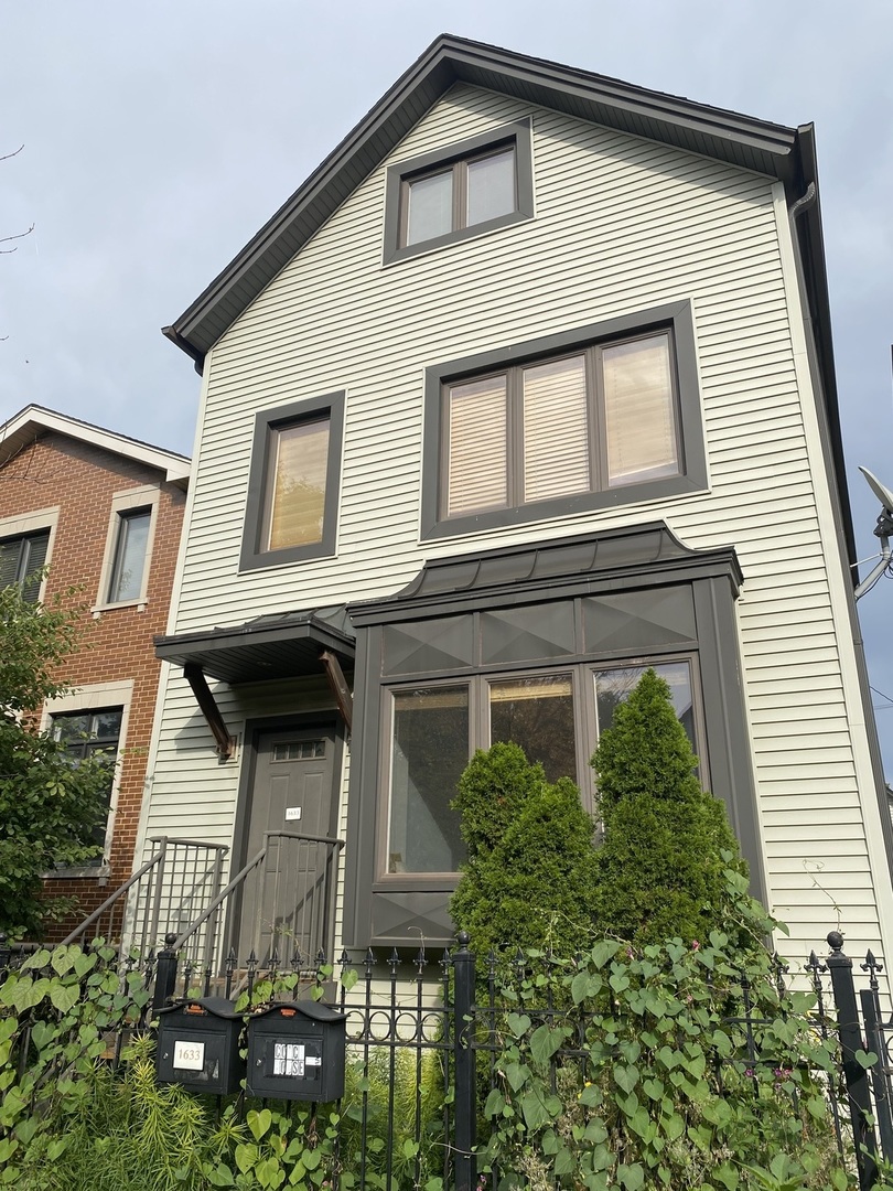 a view of a house with many windows