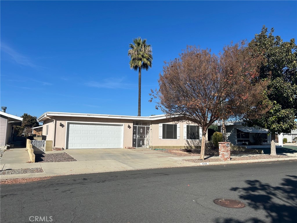 a view of a house with a street