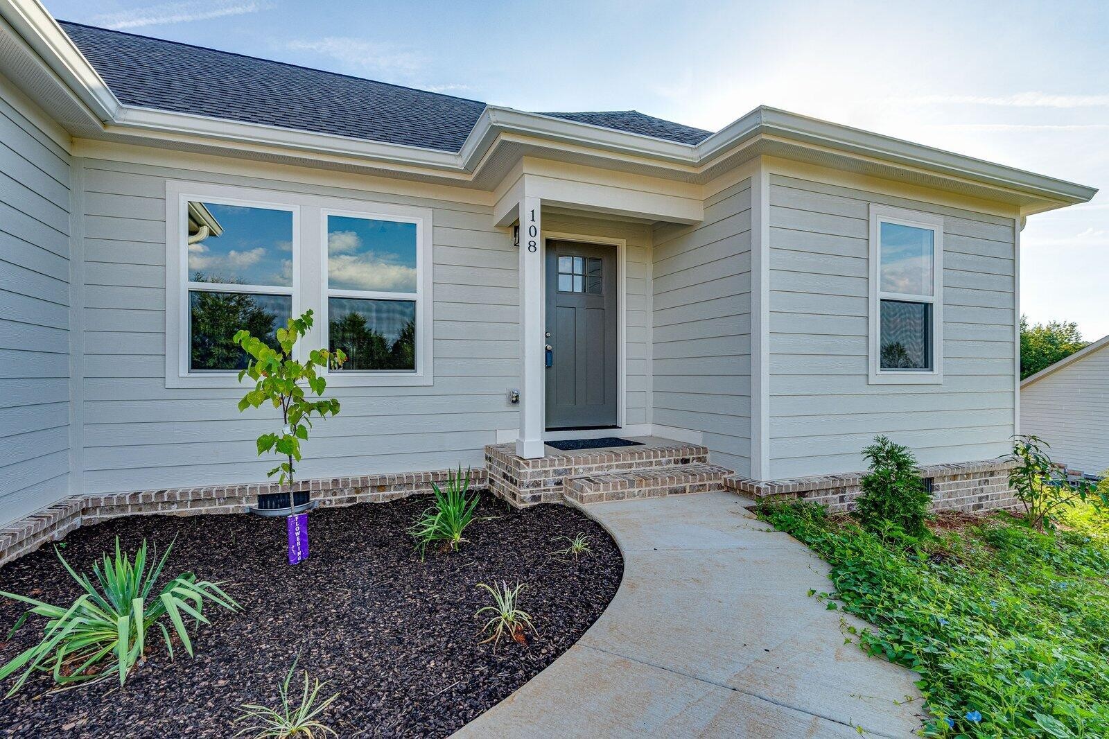 a view of a house with a patio