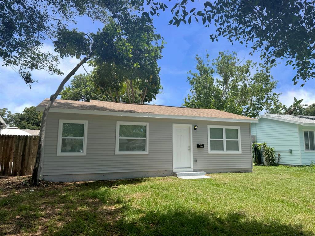 front view of a house with a yard