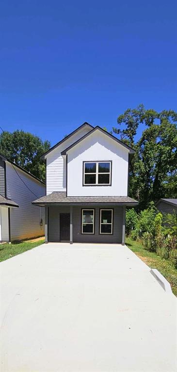 a house view with a outdoor space