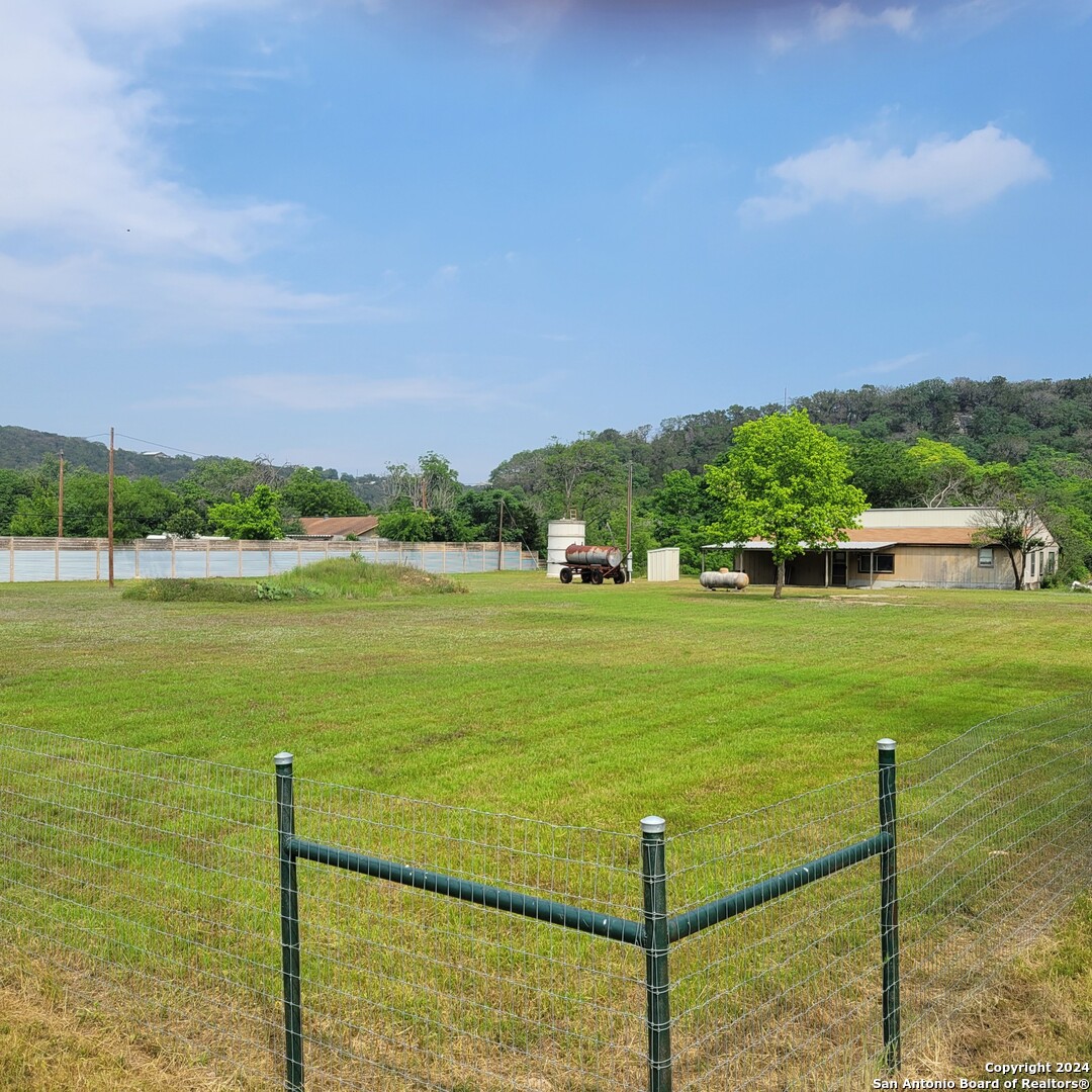 a view of a lake with a big yard