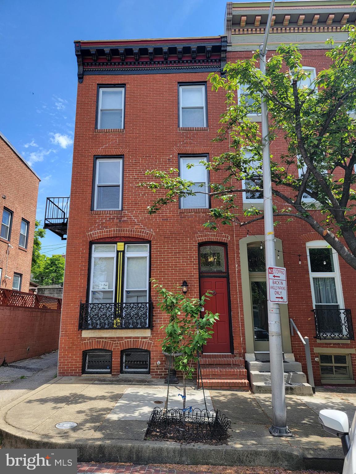 a front view of a multi story residential apartment building