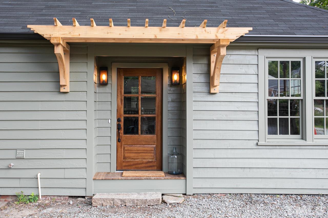 a front view of a house with a garage