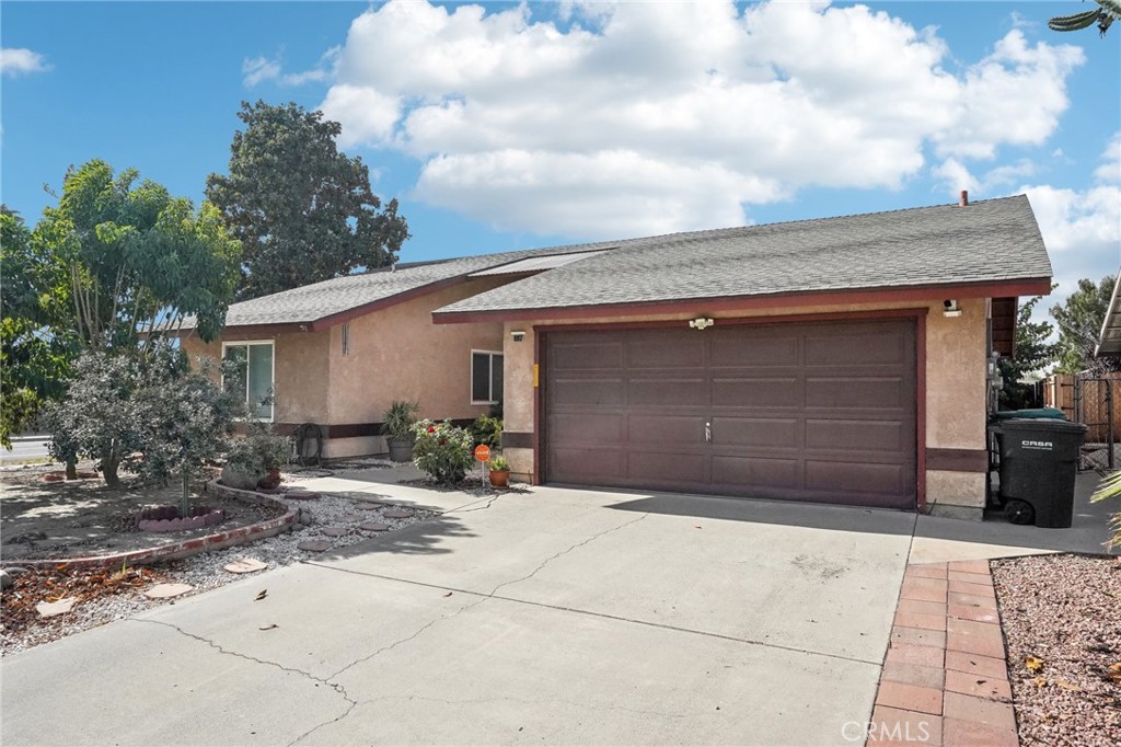 a backyard of a house with yard and garage