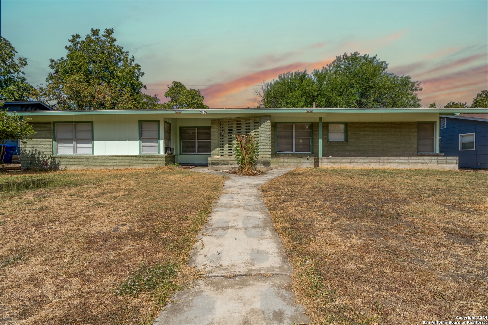 front view of a house with yard