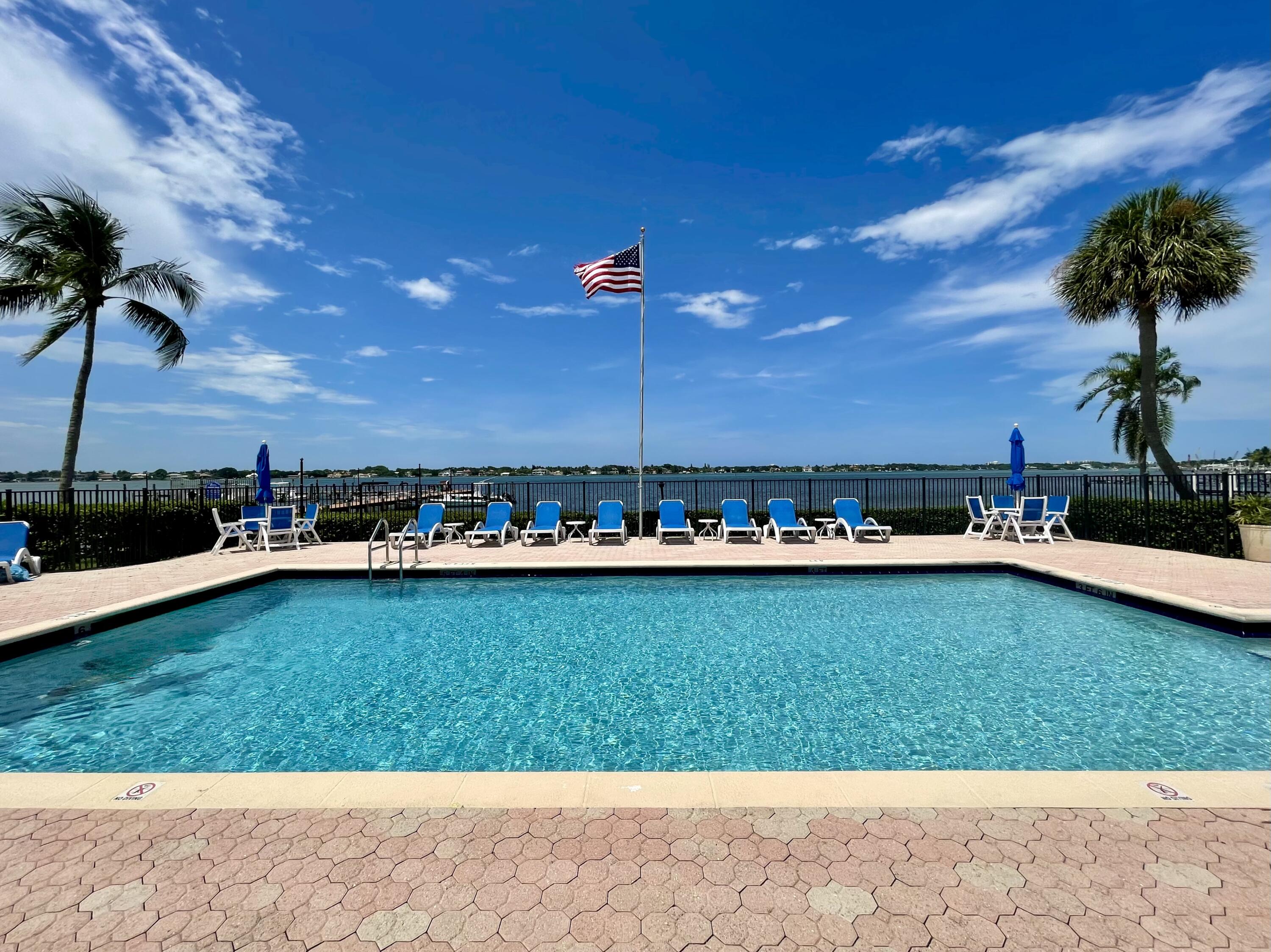 a view of a swimming pool and an outdoor space