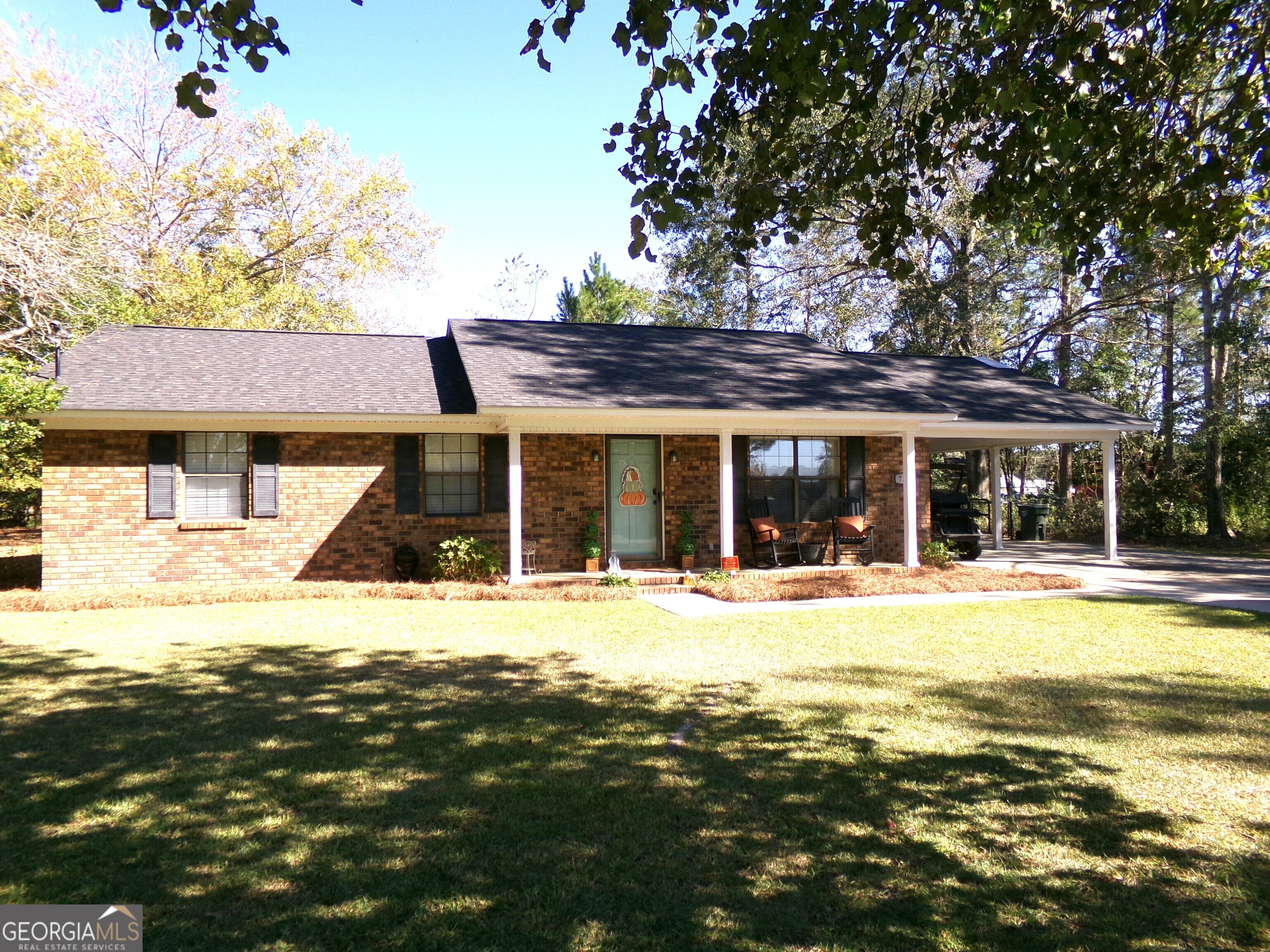 a front view of a house with a ocean view