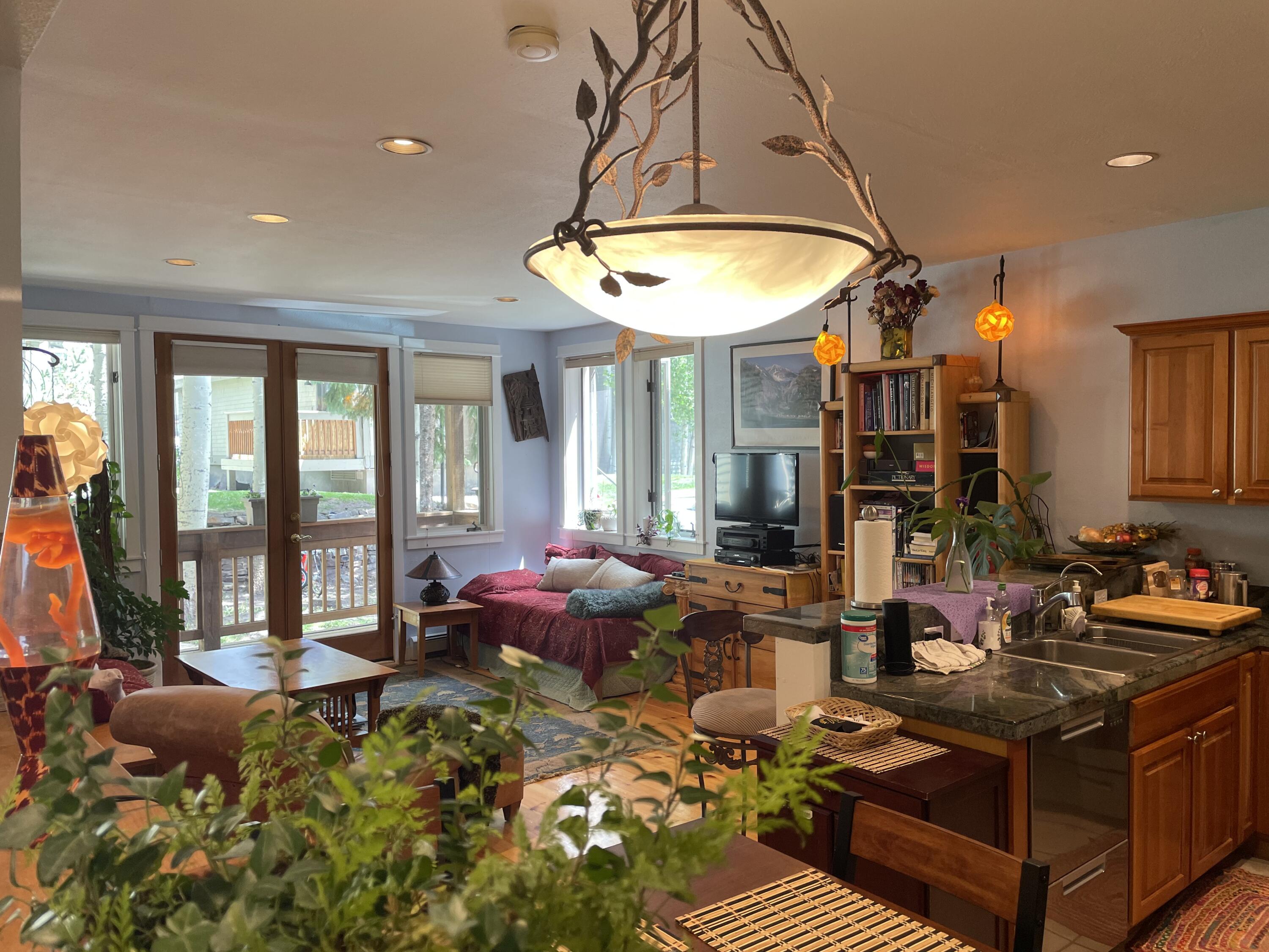 a living room with patio furniture