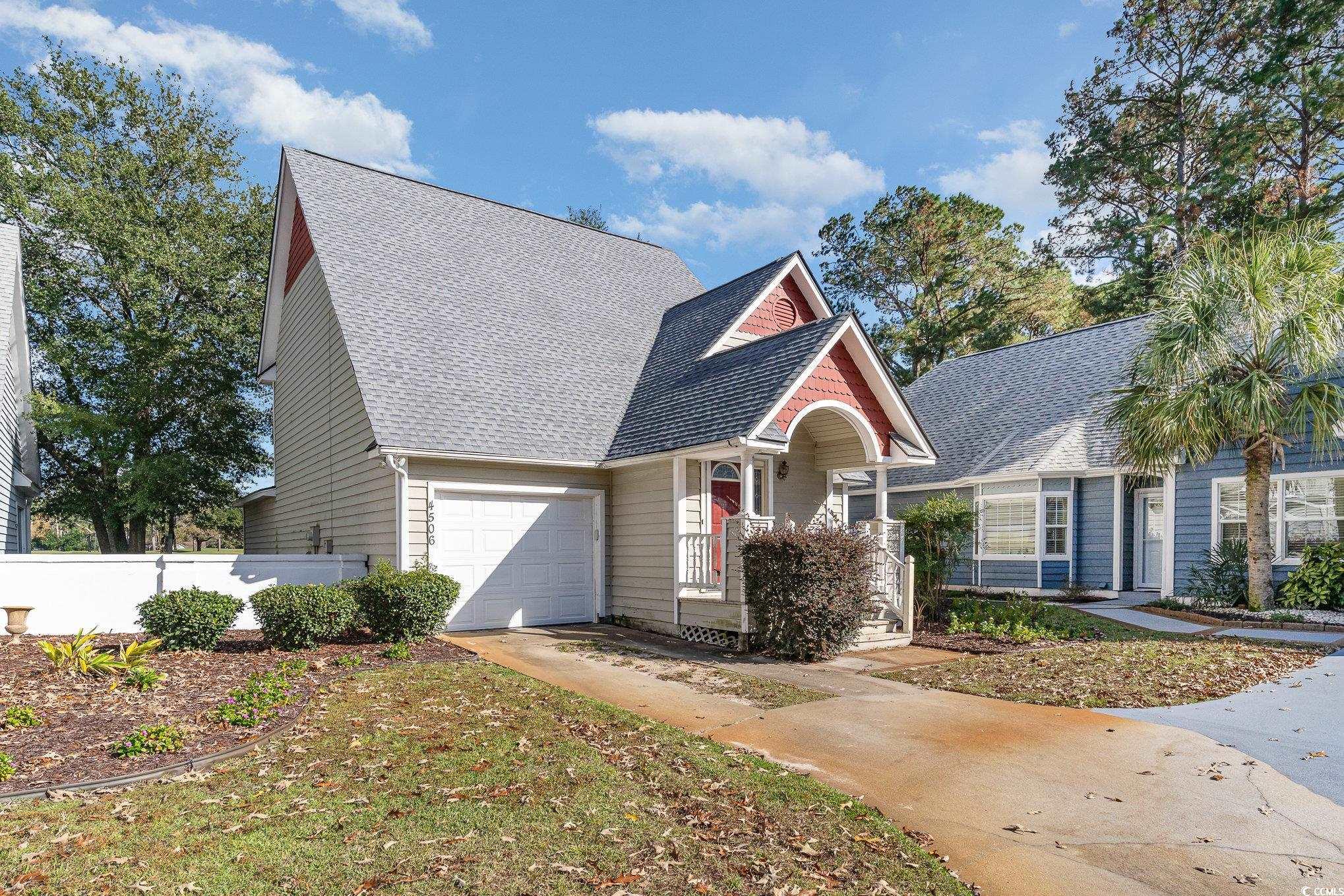 View of front of home with a garage