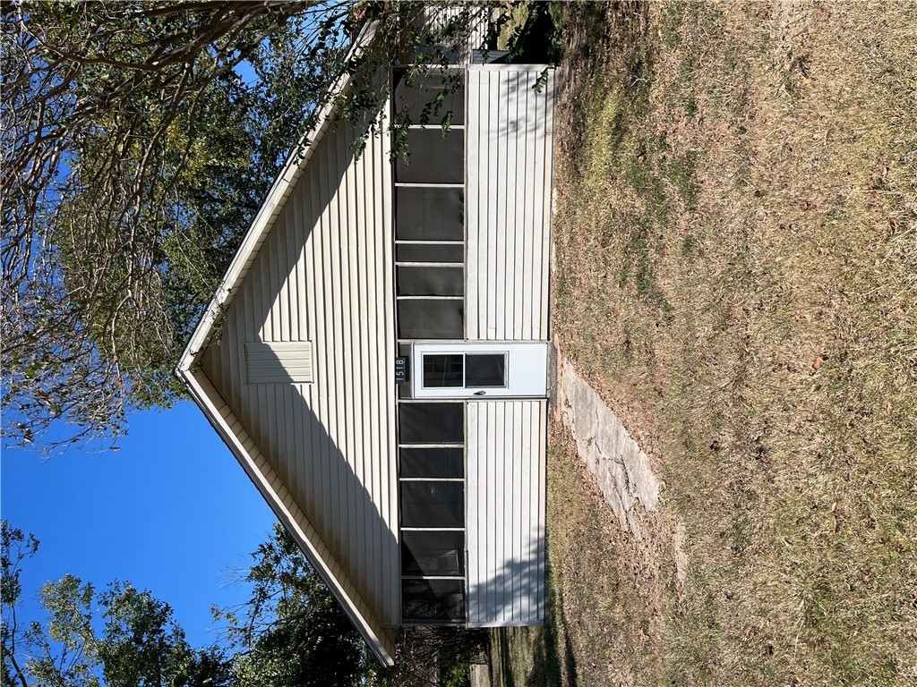 a house with trees in the background