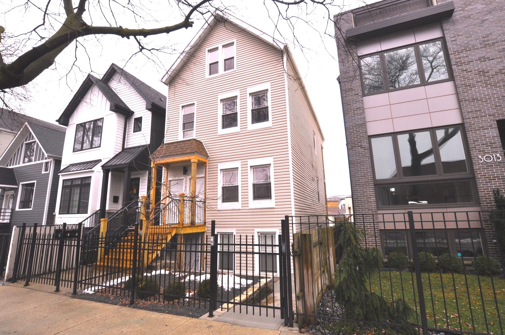 a front view of a house with glass windows