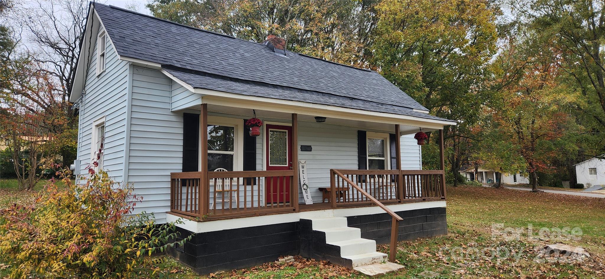 a front view of a house with porch