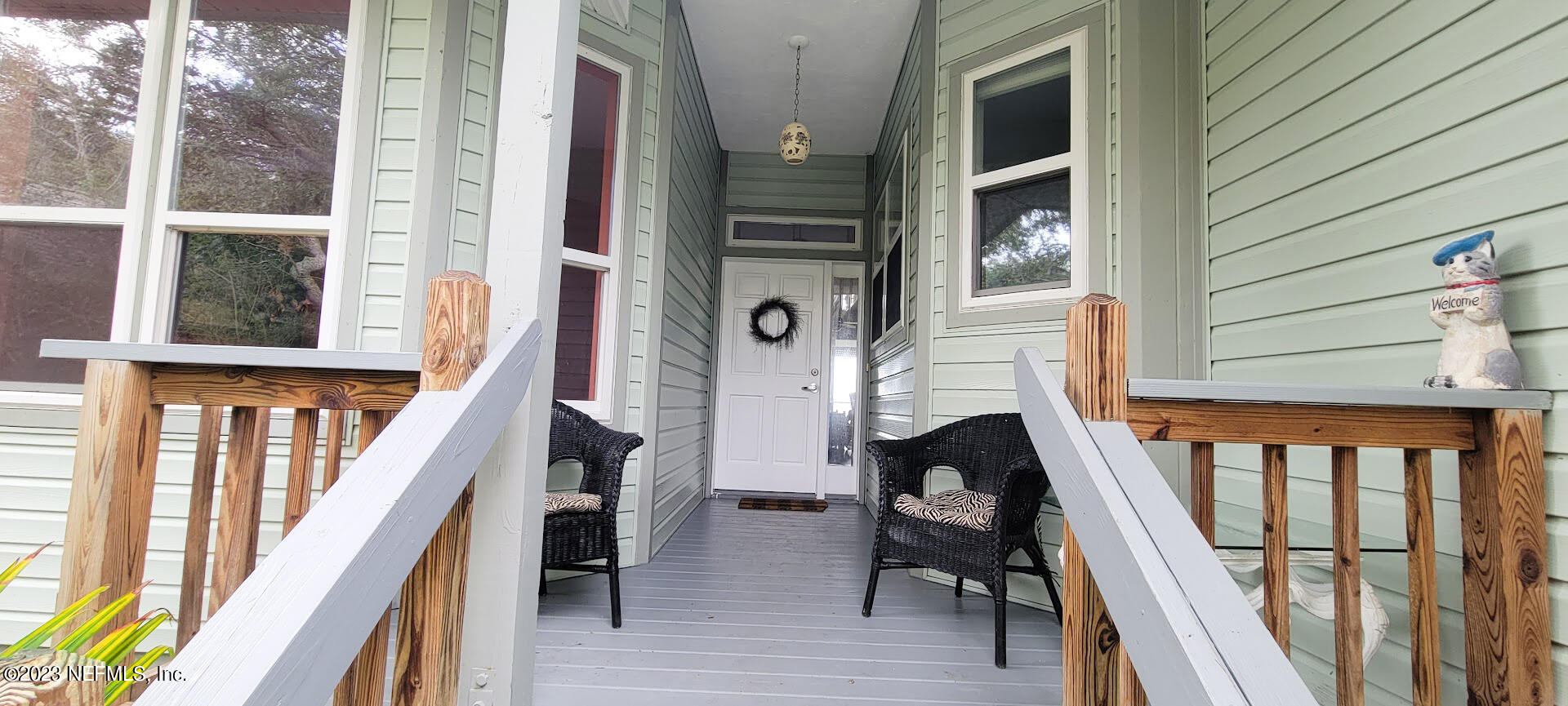 a view of balcony with furniture